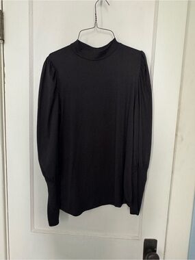 Celeste Black Top with Red Heart Tag